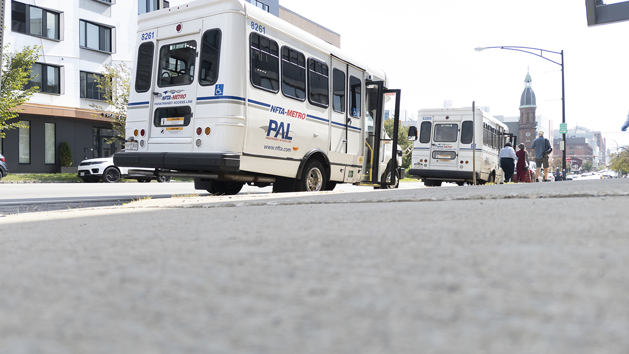 Two PAL vans on street